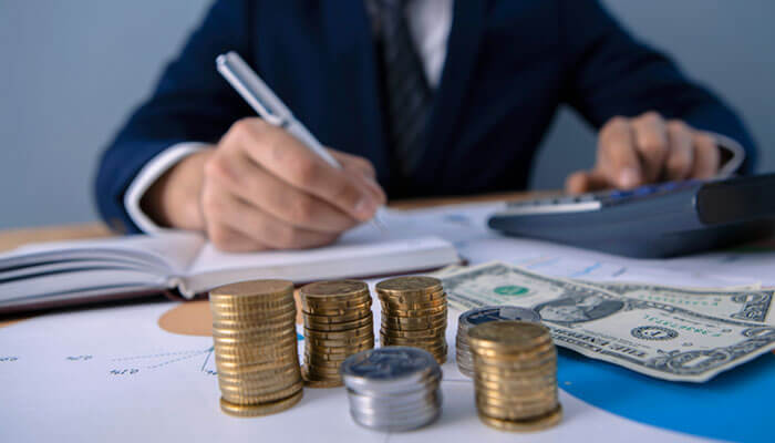 How Can an Insurance Company Make a Profit by Taking in Premiums and Making Payouts?