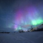 Alaska car insurance requirements remote highway through Alaska mountains and wilderness