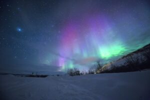 Alaska car insurance requirements remote highway through Alaska mountains and wilderness