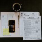 Credit report and car keys representing how credit scores affect car insurance rates