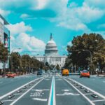 Washington DC car insurance requirements city street with US Capitol building