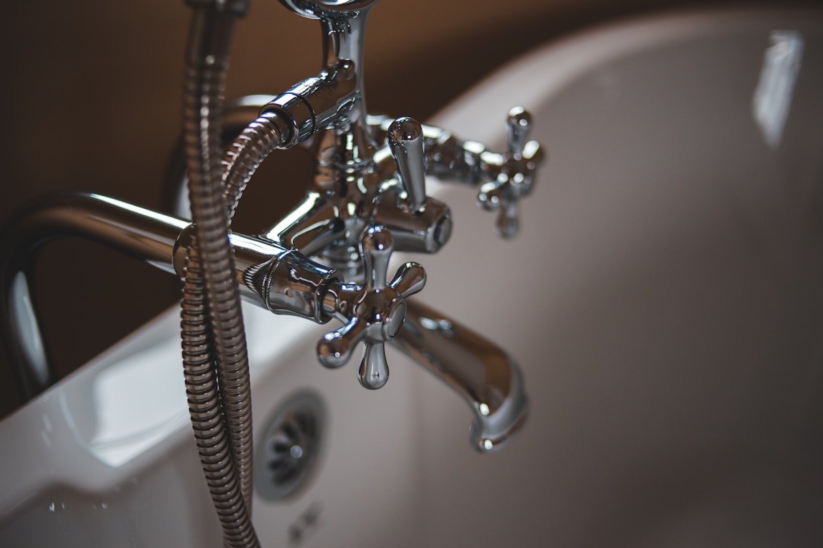 Water leaking from a burst pipe, illustrating homeowners insurance burst pipe coverage