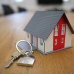 New car keys on a loan document, illustrating whether Progressive offers gap insurance