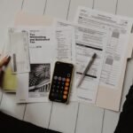 Person signing an auto loan agreement for a new car, illustrating whether State Farm offers gap insurance